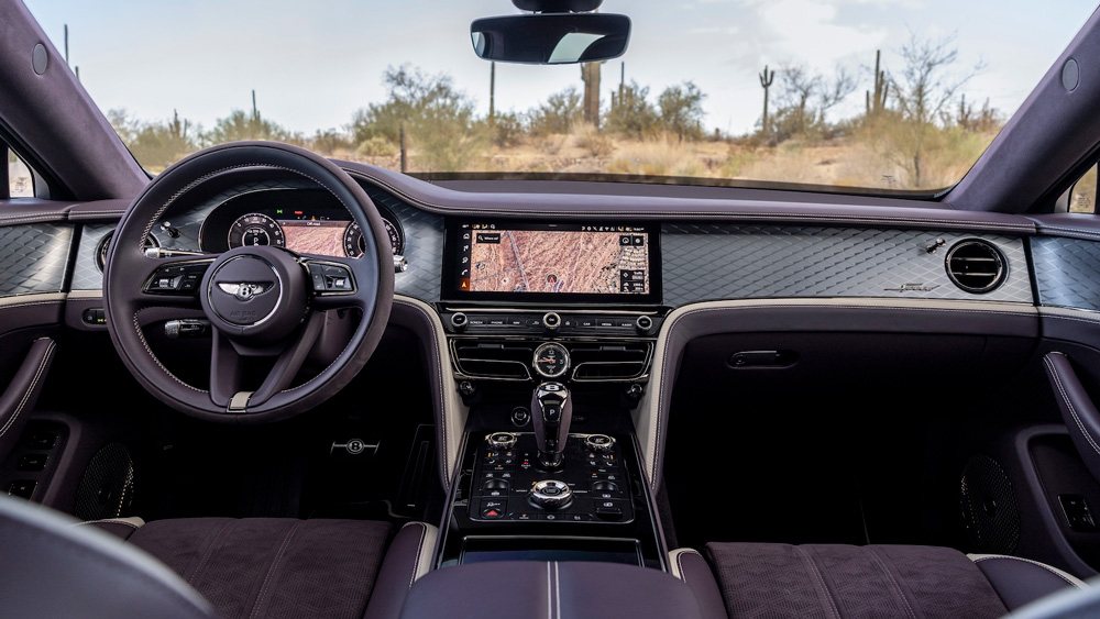 Prunkwagen 
Das Cockpit des Bentley Fyling Spur ist für ein Auto des Modelljahrs 2025 immer noch sehr konservativ gestaltet. Die Anzeigen sind immerhin digital. Und die Materialgüte und Verarbeitungsqualität über jeden Zweifel erhaben. Fotos: Bentley   